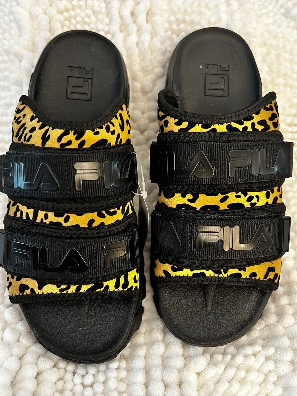 Fila Women’s Black Strappy Slides with Gold Leopard Print